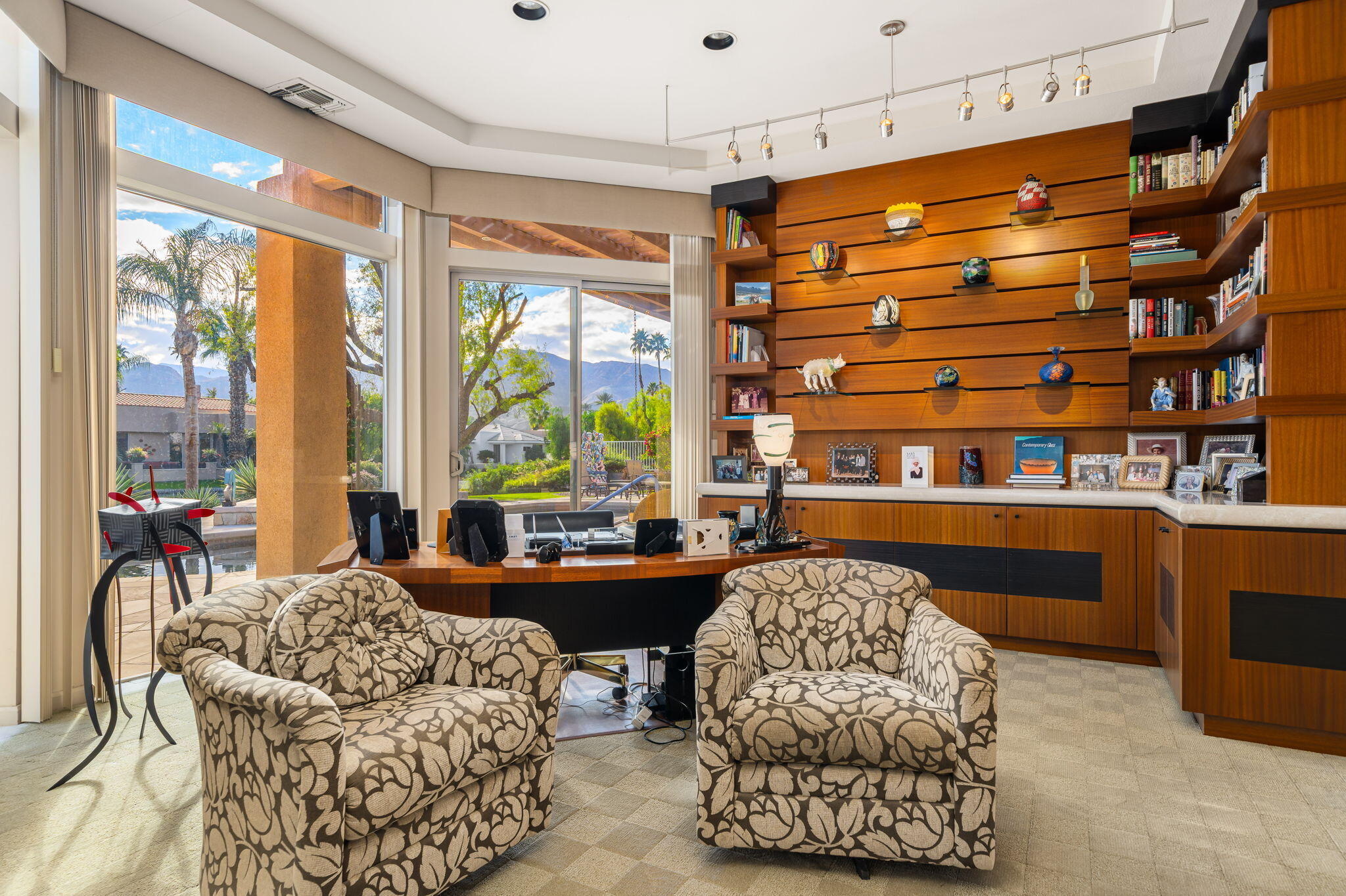 206 Crystal Bay Court Rancho Mirage, CA 92270 - Photo 45 of 62 a living room with a couch and a large window