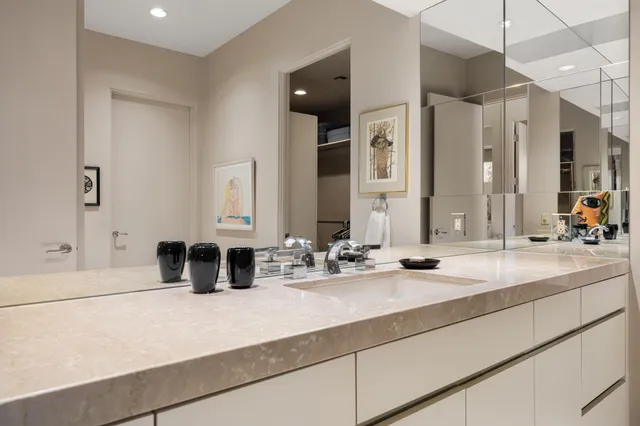 a kitchen with stainless steel appliances granite countertop a sink and cabinets