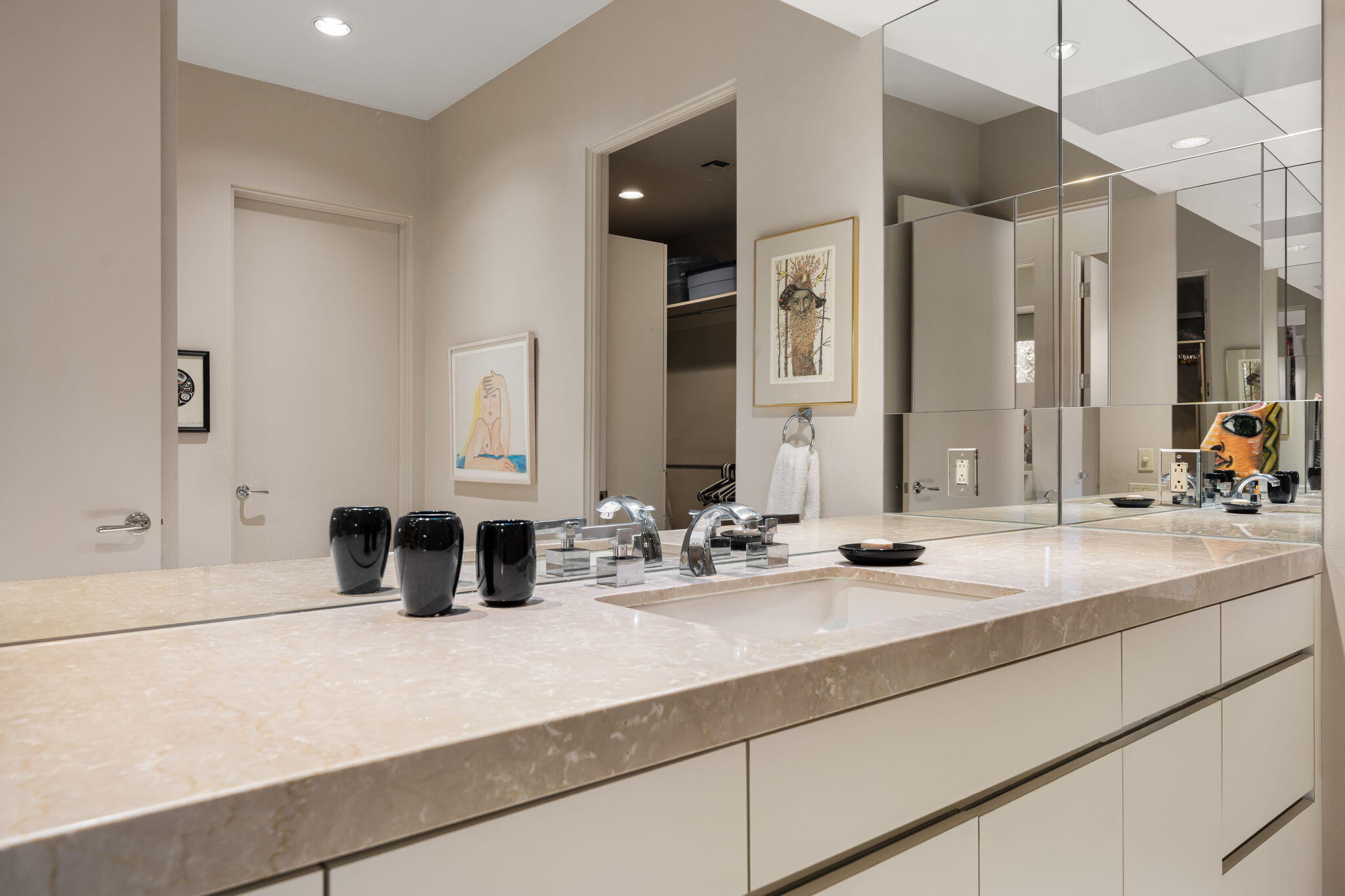 206 Crystal Bay Court Rancho Mirage, CA 92270 - Photo 47 of 62 a bathroom with double vanity sinks and a mirror