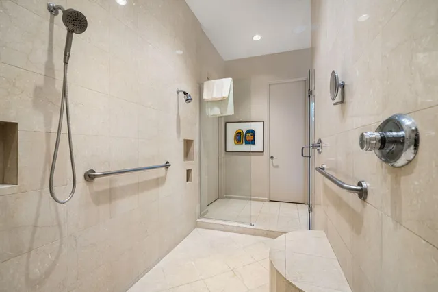 a kitchen with stainless steel appliances granite countertop a sink and cabinets