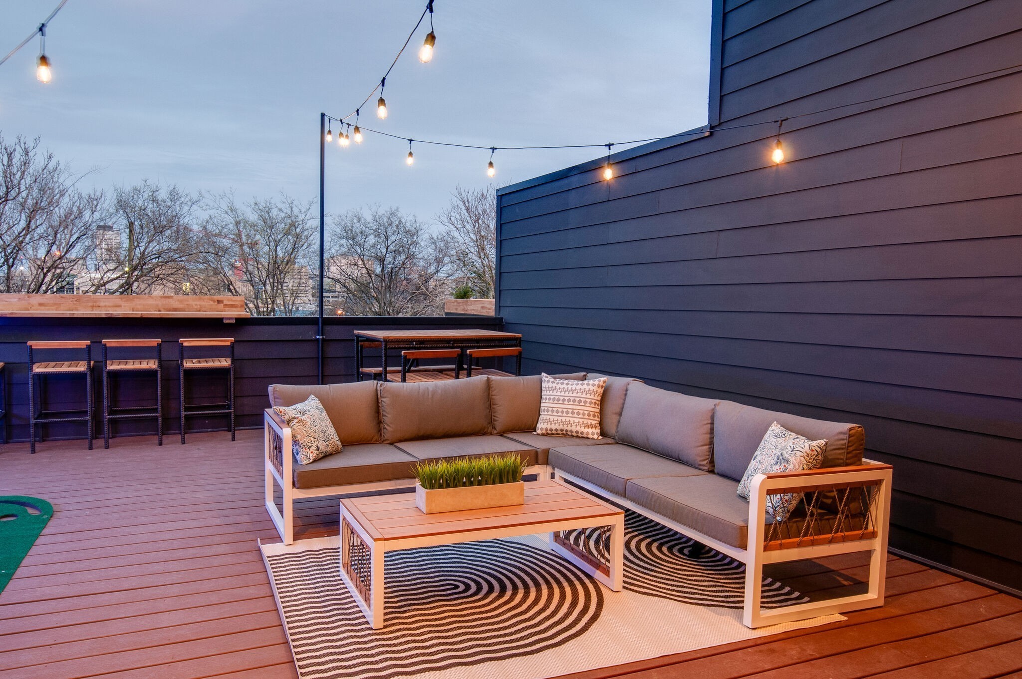 613 A 21st Avenue North Nashville, TN 37203 - Photo 39 of 59 a outdoor living space with furniture and wooden floor