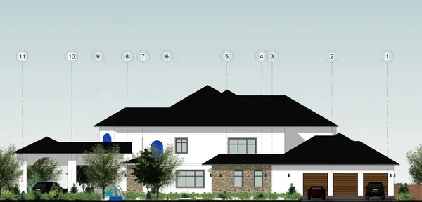 a black and white house with a yard