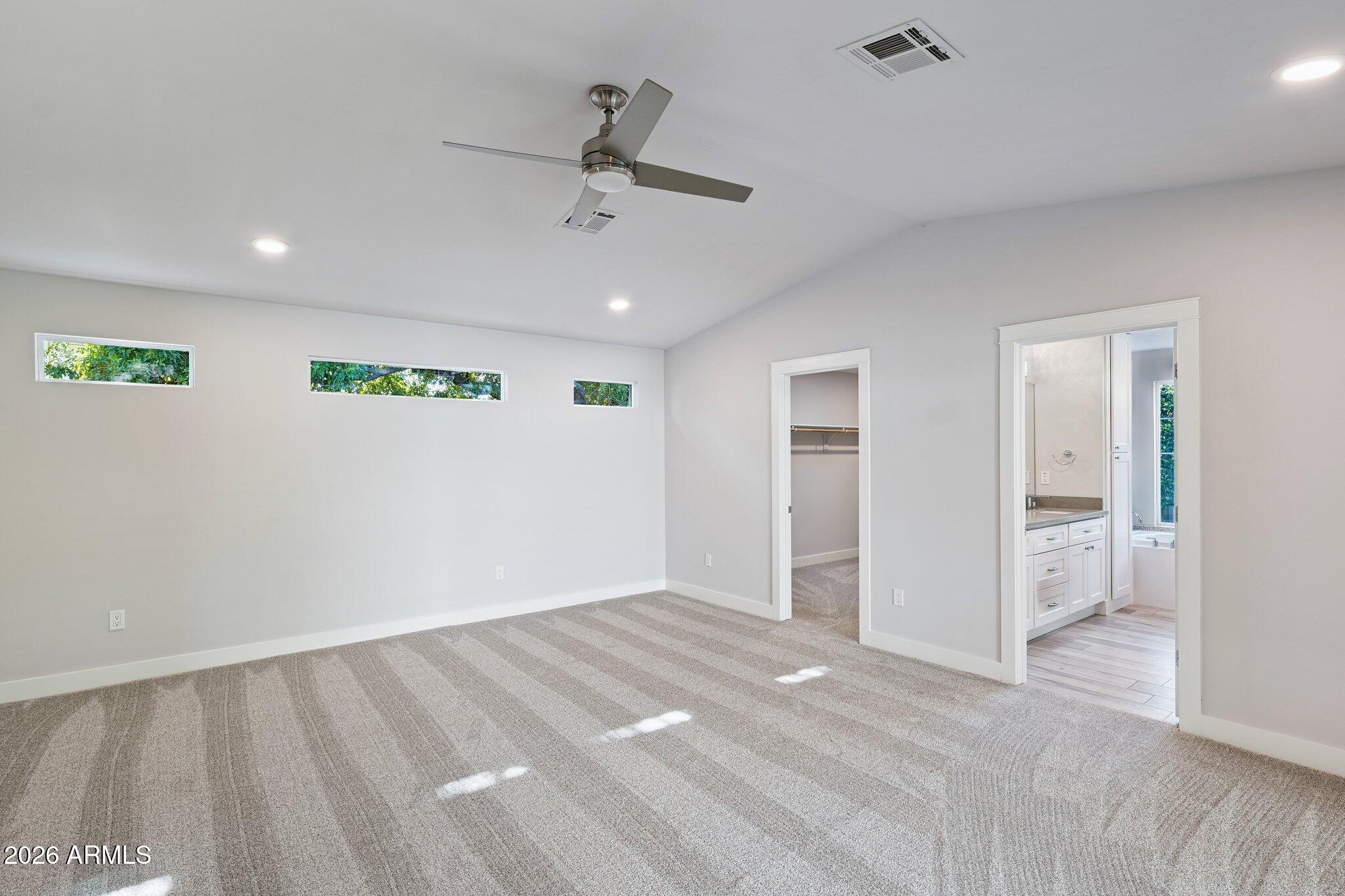 4232 North 19th Place Phoenix, AZ 85016 - Photo 14 of 39 wooden floor in an empty room with a window