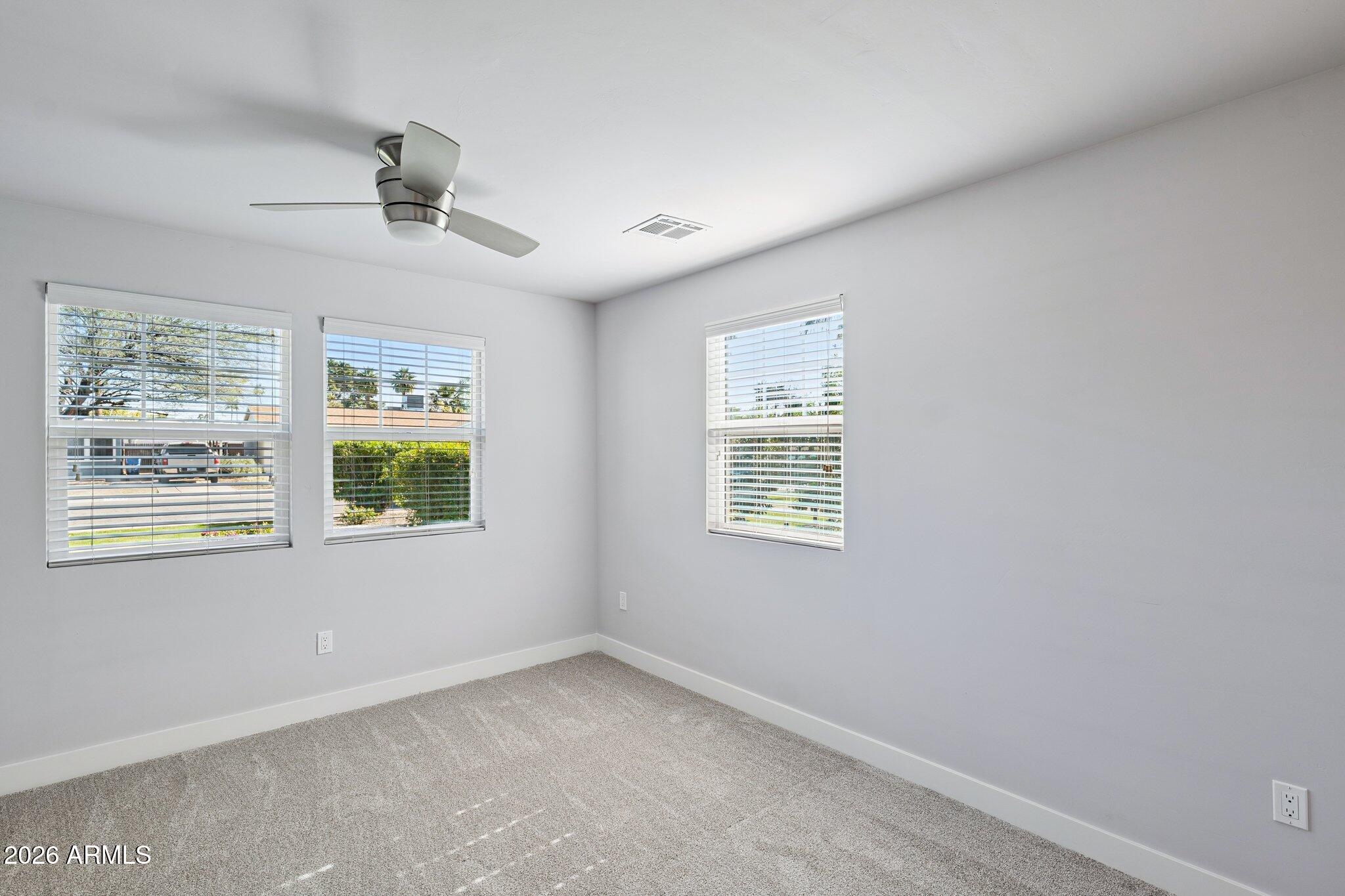 4232 North 19th Place Phoenix, AZ 85016 - Photo 23 of 39 a view of an empty room with a window