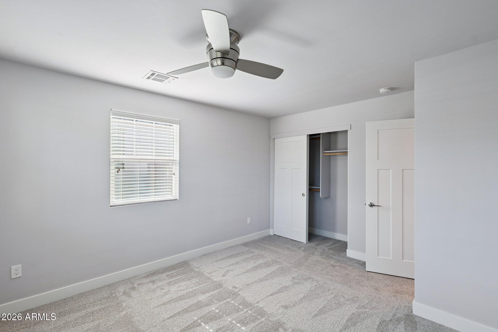 4232 North 19th Place Phoenix, AZ 85016 - Photo 24 of 39 a view of an empty room with a window