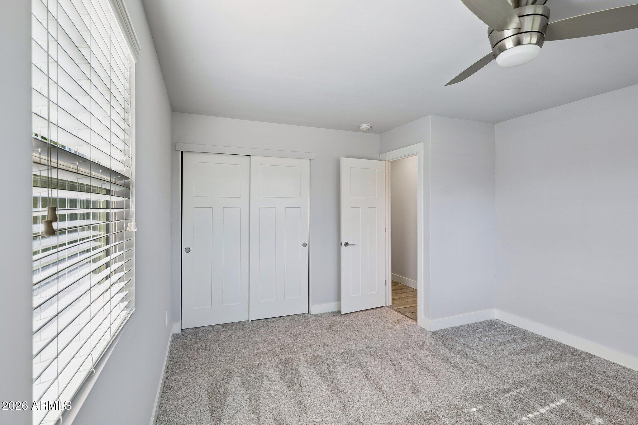 4232 North 19th Place Phoenix, AZ 85016 - Photo 25 of 39 a view of an empty room with a window