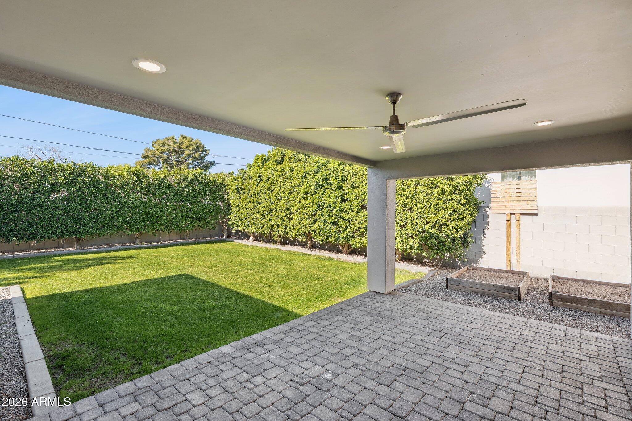 4232 North 19th Place Phoenix, AZ 85016 - Photo 36 of 39 a view of a swimming pool and a yard