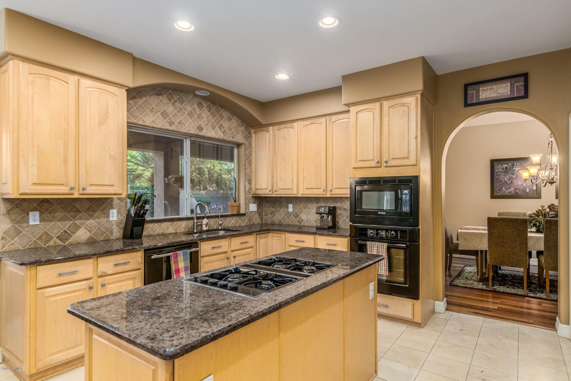 6015 East Phelps Road Scottsdale, AZ 85254 - Photo 14 of 72 Kitchen t o Dining