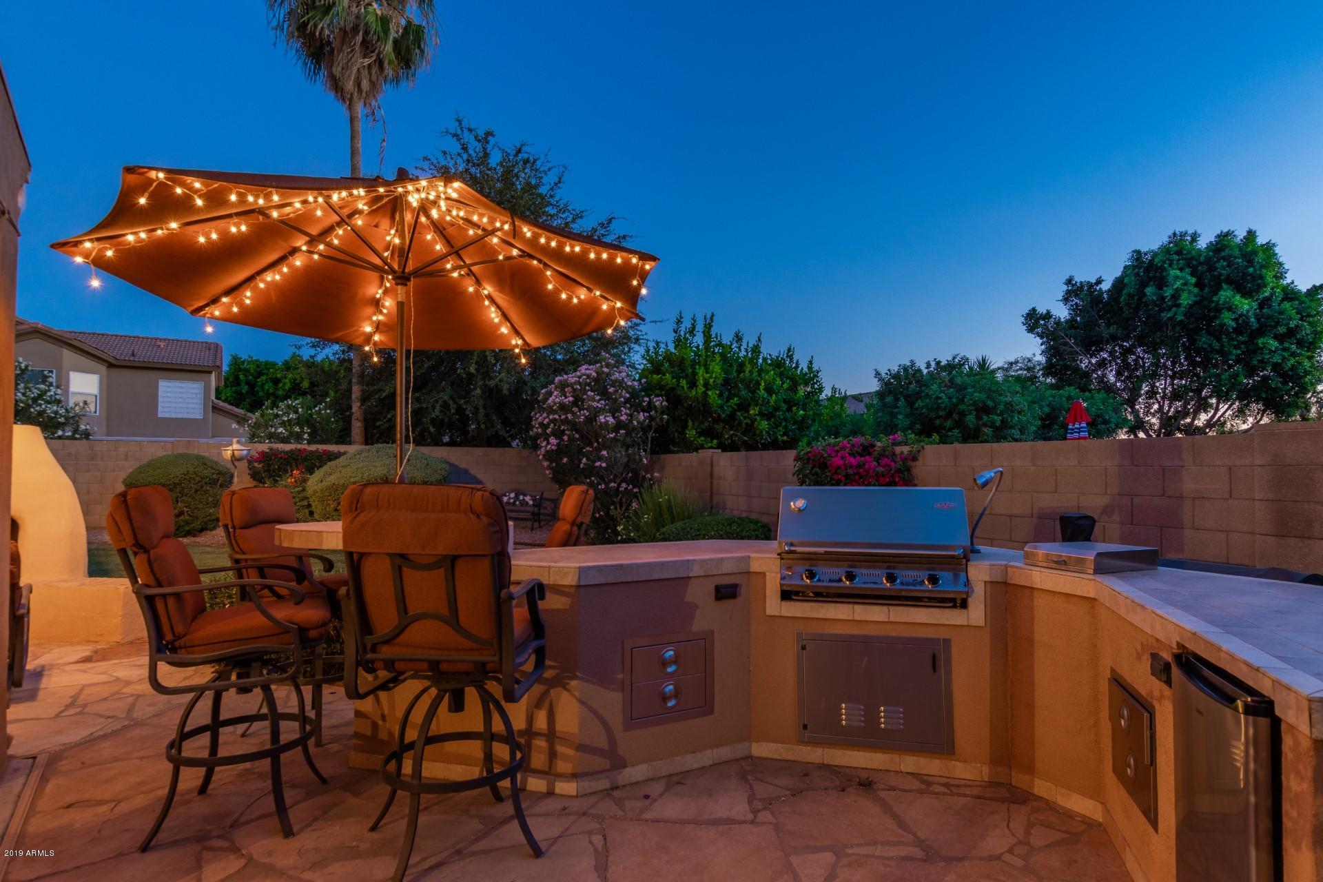 6015 East Phelps Road Scottsdale, AZ 85254 - Photo 65 of 72 a outdoor view with a sitting space
