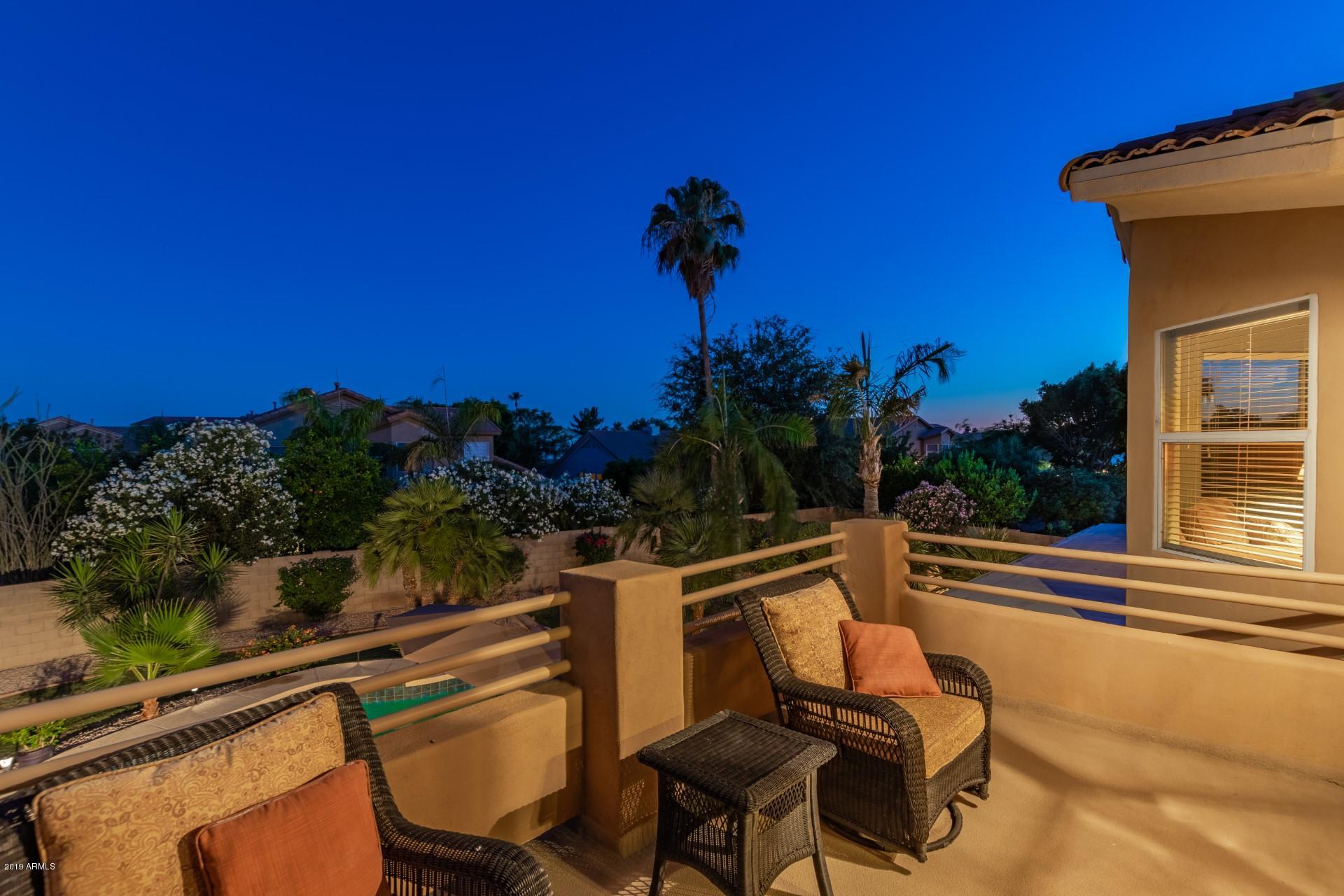 6015 East Phelps Road Scottsdale, AZ 85254 - Photo 72 of 72 a view of a chairs and table in patio