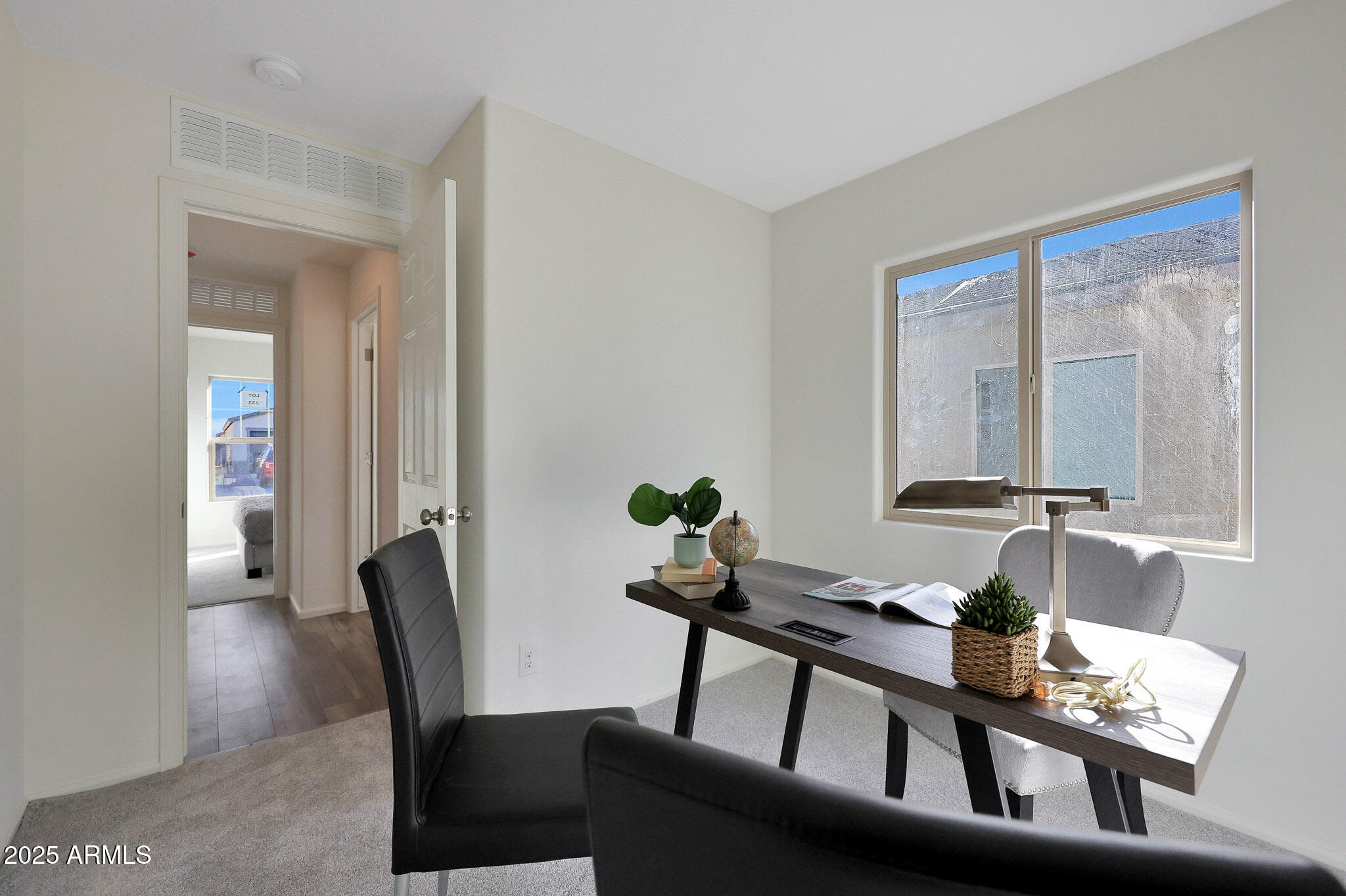 1319 West Aztec Drive Coolidge, AZ 85128 - Photo 15 of 18 a view of a dining room with furniture and wooden floor