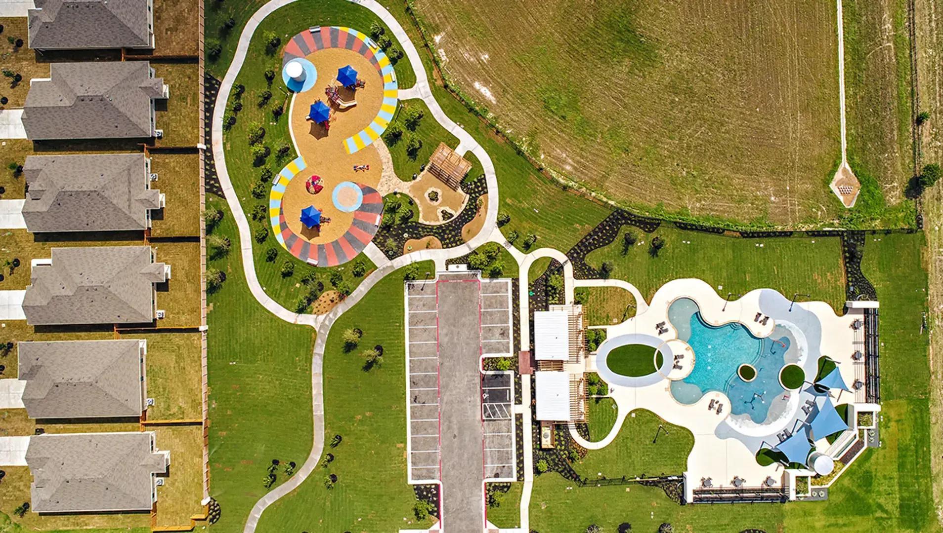 208 Abby Road Georgetown, TX 78626 - Photo 8 of 40 an aerial view of a swimming pool with a fountain