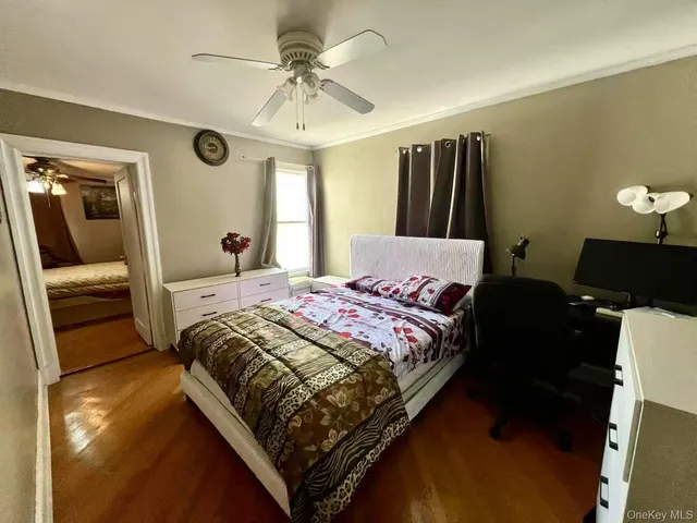 a bedroom with a bed and a walk in closet