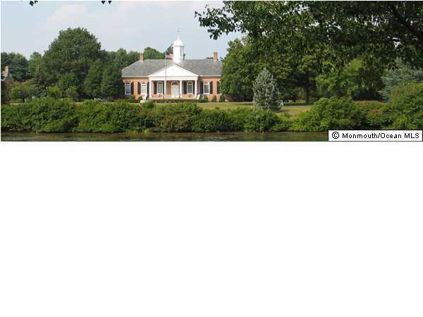 25 Beaver Dam Road Colts Neck, NJ 07722 - Photo 12 of 15 a front view of a house with a yard
