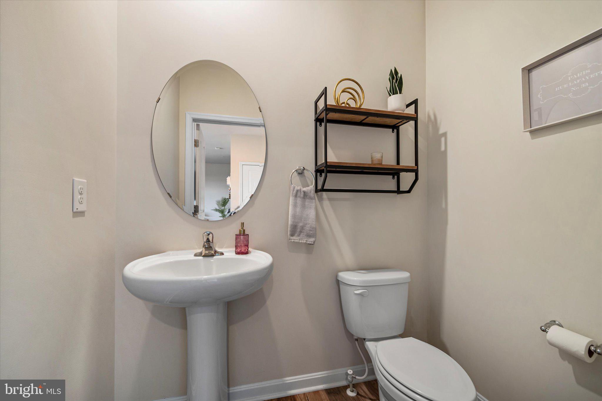 2004 Fauna Drive Frederick, MD 21702 - Photo 12 of 46 a bathroom with a toilet sink and mirror