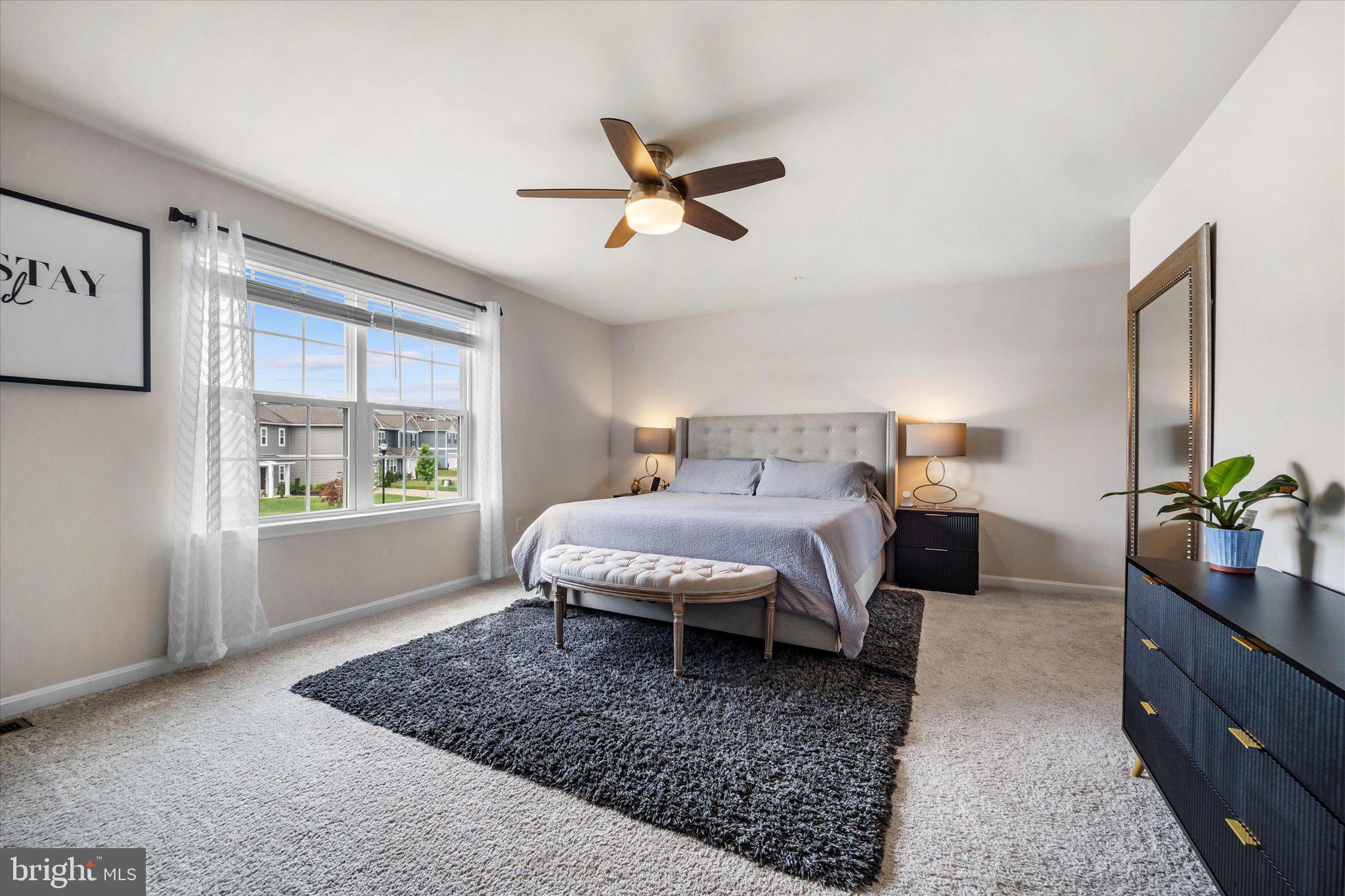 2004 Fauna Drive Frederick, MD 21702 - Photo 19 of 46 a spacious bedroom with a large bed and a window