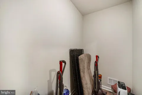 a view of a closet with storage