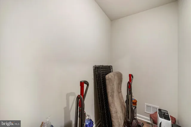 a view of a closet with storage
