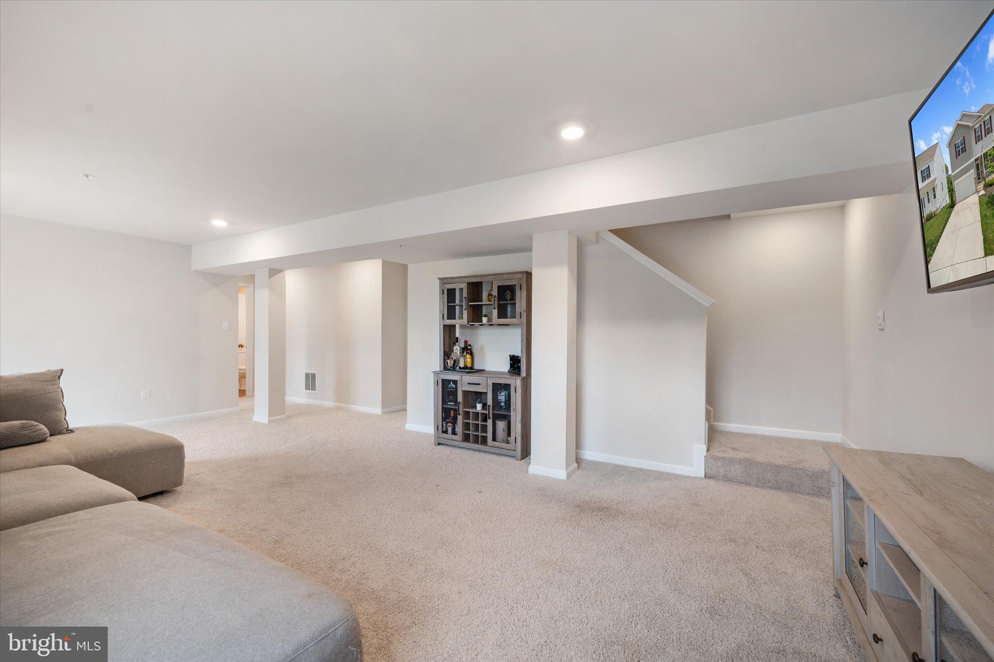 2004 Fauna Drive Frederick, MD 21702 - Photo 33 of 46 a large bedroom with a bed and a walk in closet