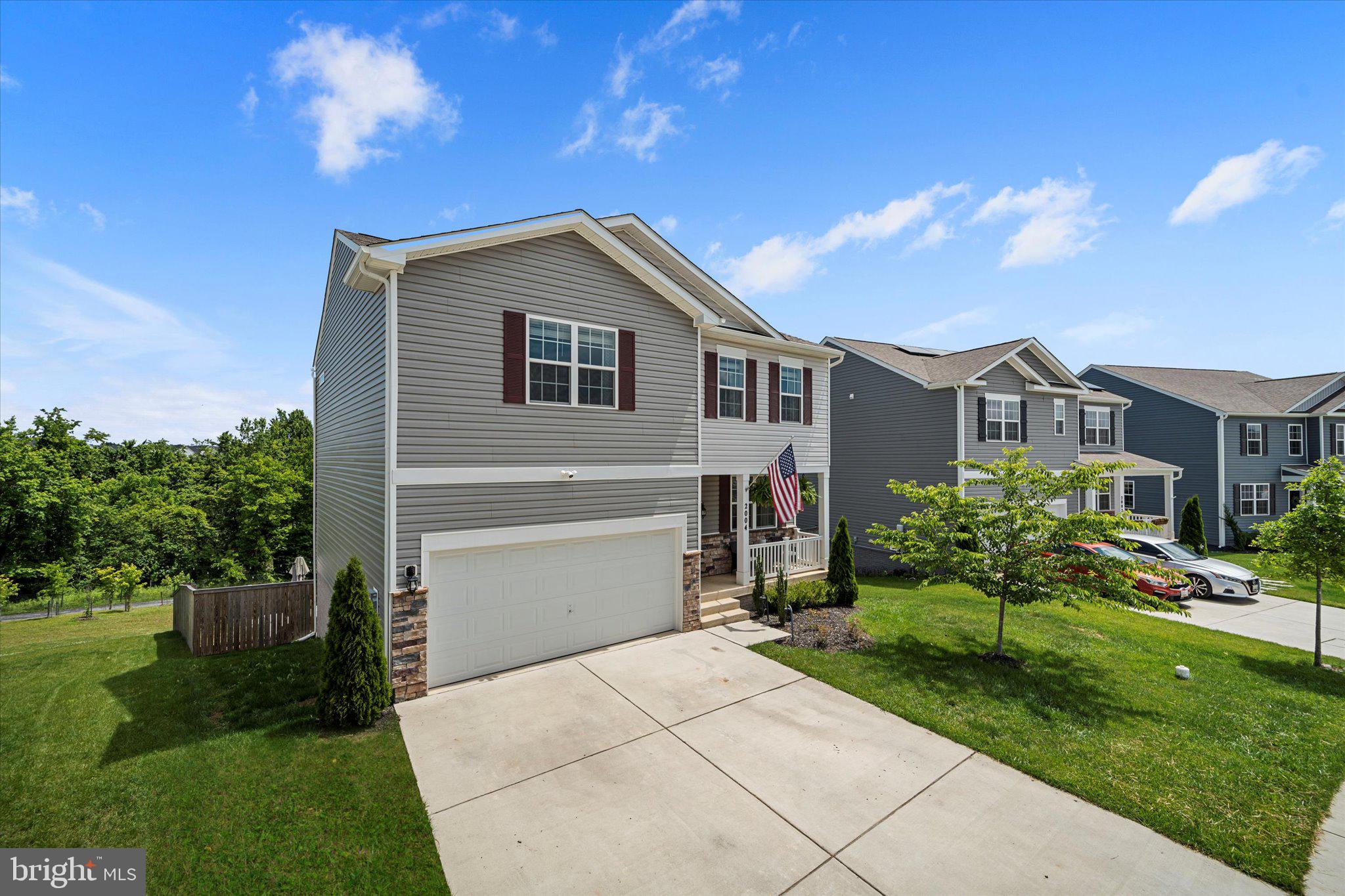 2004 Fauna Drive Frederick, MD 21702 - Photo 41 of 46 a front view of a house with a yard