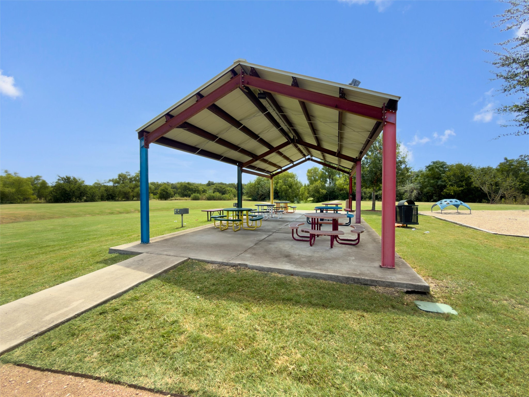 724 Lavaca Loop Elgin, TX 78621 - Photo 38 of 40 A covered pavilion sits adjacent to open grassy recreation space.