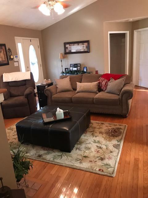1213 Navigation Point Goodview, VA 24095 - Photo 22 of 30 a living room with furniture and wooden floor