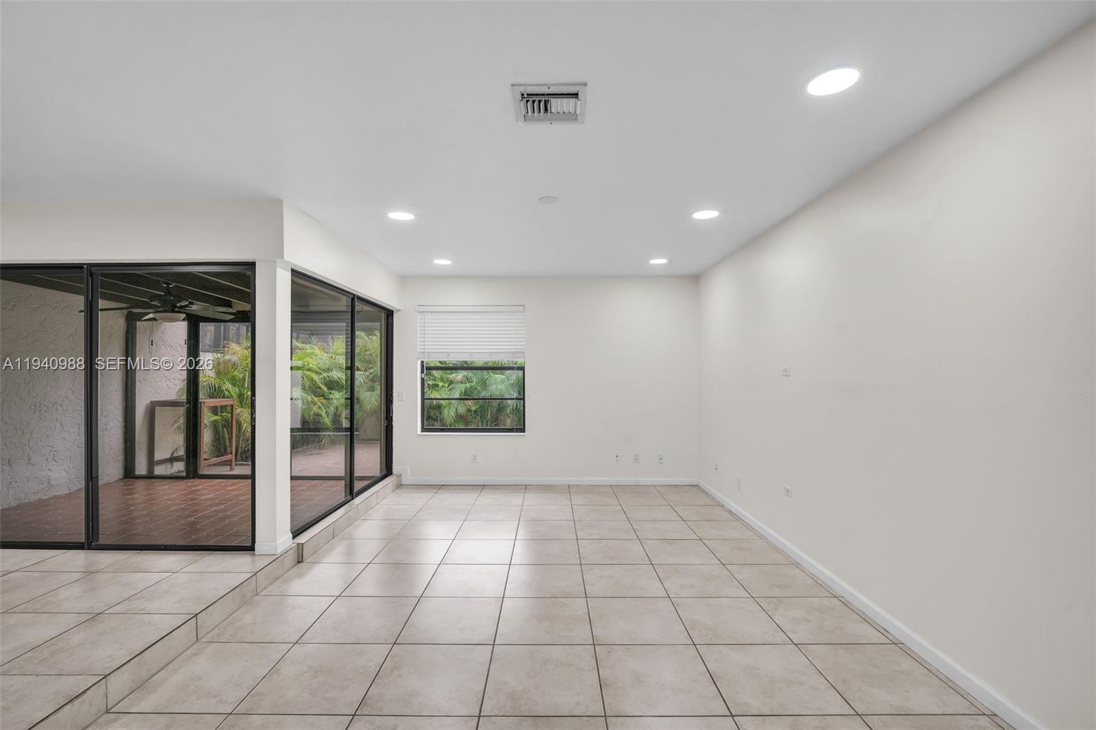 11125 Southwest 134th Court Miami, FL 33186 - Photo 12 of 33 a view of empty room