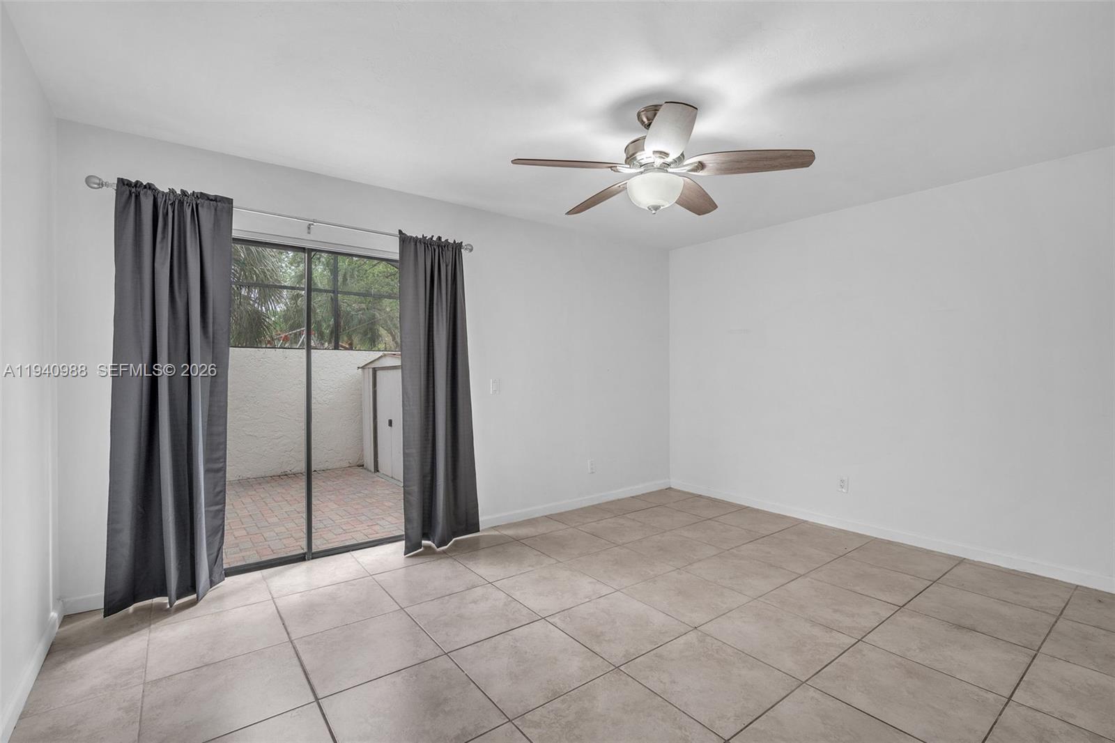 11125 Southwest 134th Court Miami, FL 33186 - Photo 15 of 33 a view of an empty room with a window