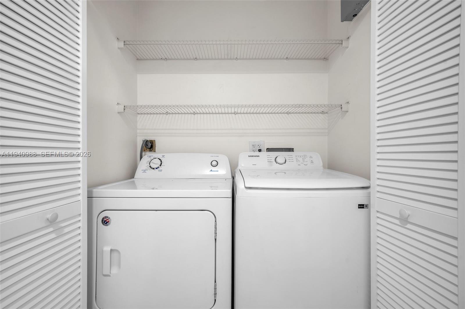 11125 Southwest 134th Court Miami, FL 33186 - Photo 23 of 33 a utility room with dryer and washer
