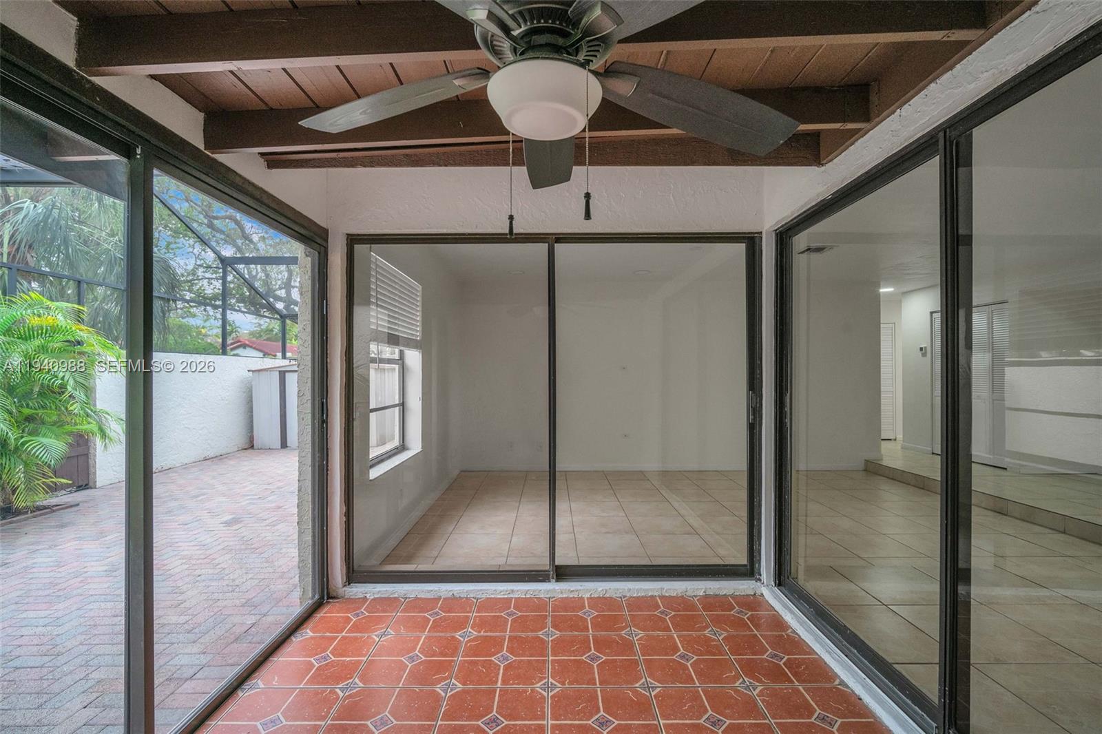 11125 Southwest 134th Court Miami, FL 33186 - Photo 26 of 33 a view of a livingroom with a chandelier