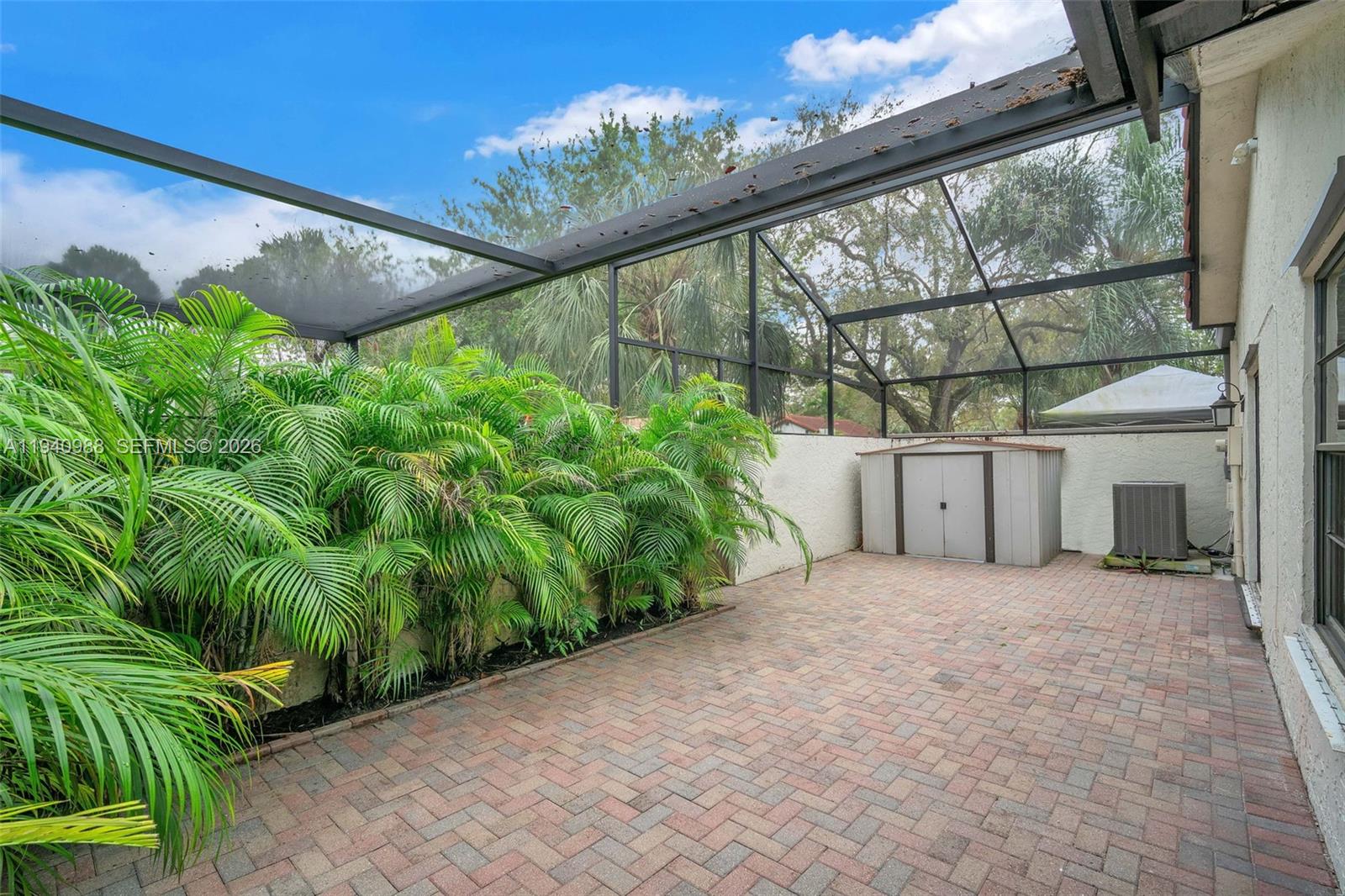 11125 Southwest 134th Court Miami, FL 33186 - Photo 27 of 33 a view of a backyard with plants