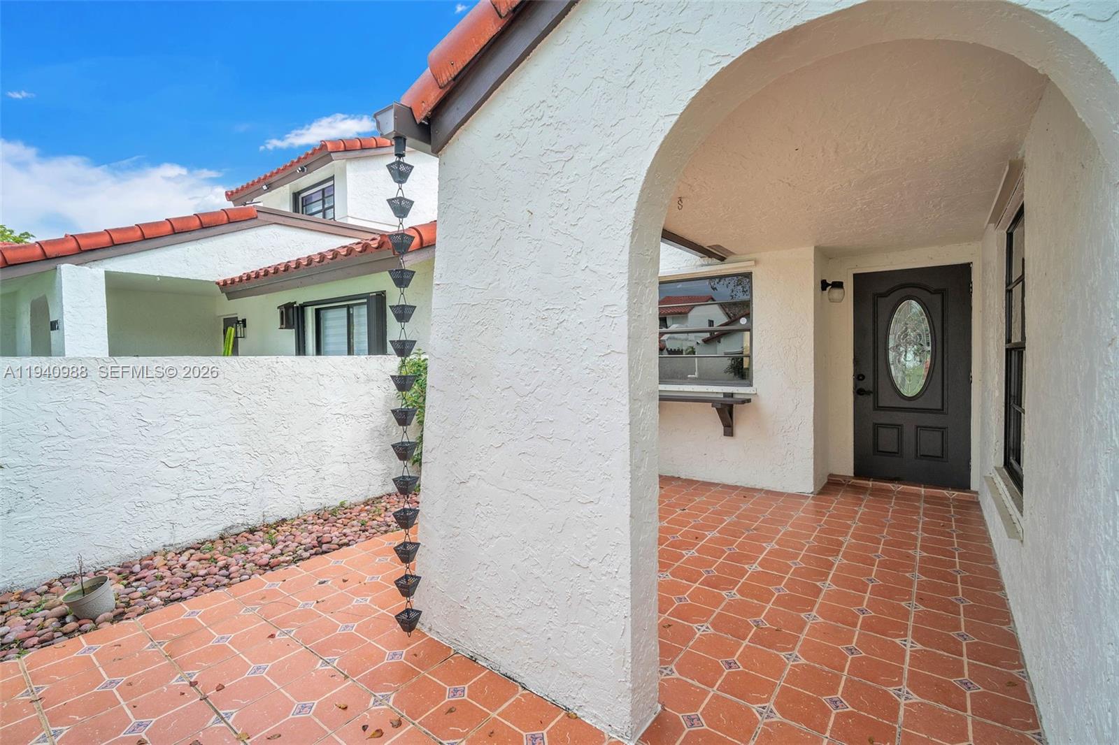 11125 Southwest 134th Court Miami, FL 33186 - Photo 4 of 33 a view of a house with a door