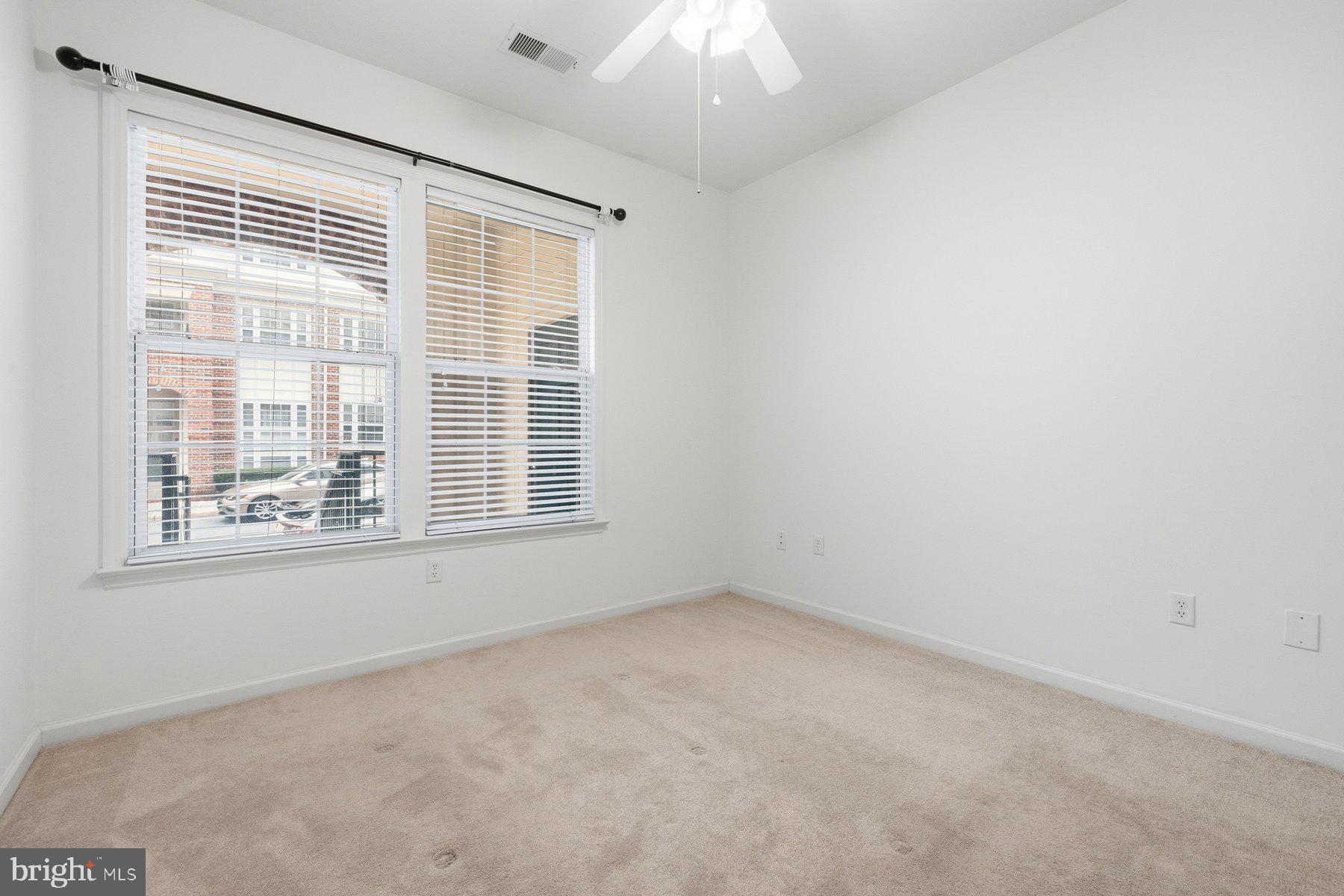 7 Booth Street, Unit 109 Gaithersburg, MD 20878 - Photo 13 of 28 an empty room with a window