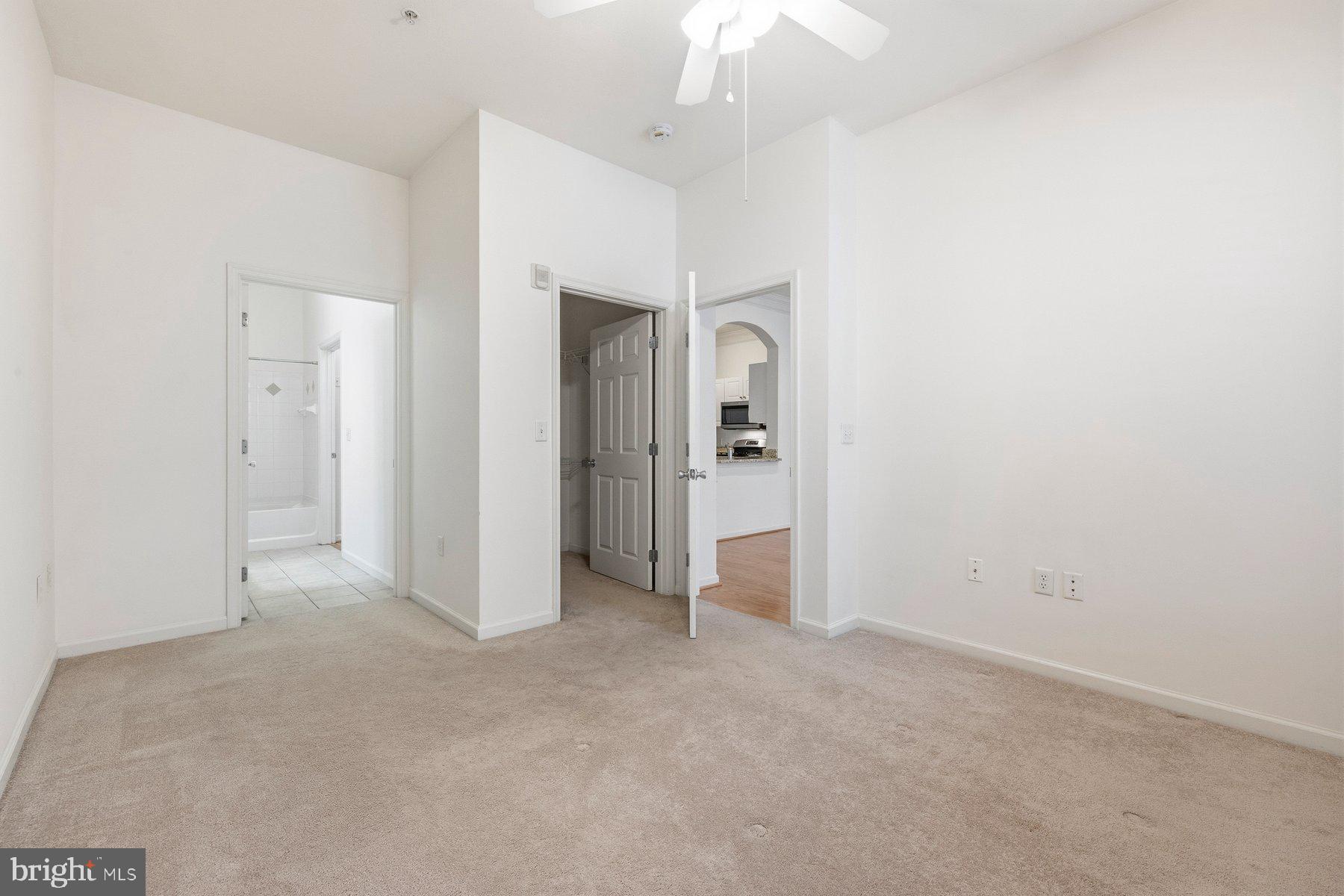 7 Booth Street, Unit 109 Gaithersburg, MD 20878 - Photo 14 of 28 an empty room with a bathroom