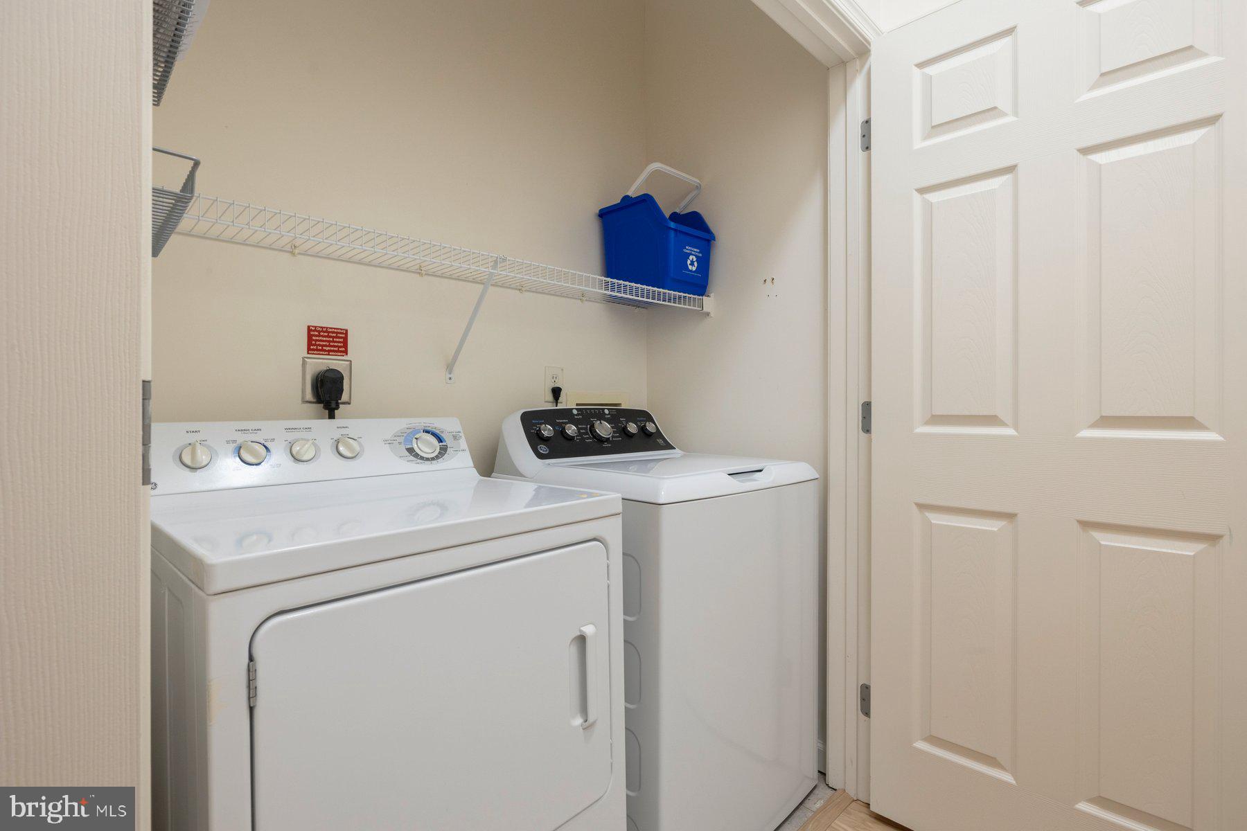 7 Booth Street, Unit 109 Gaithersburg, MD 20878 - Photo 19 of 28 a utility room with dryer and washer