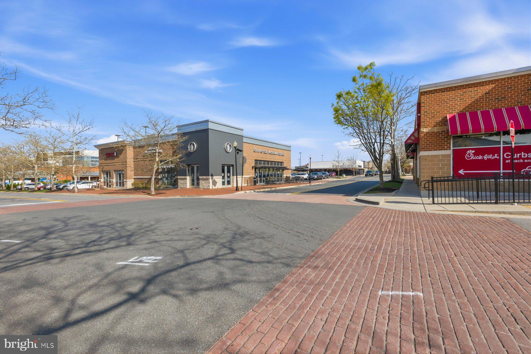 7 Booth Street, Unit 109 Gaithersburg, MD 20878 - Photo 24 of 28 a view of a street with houses