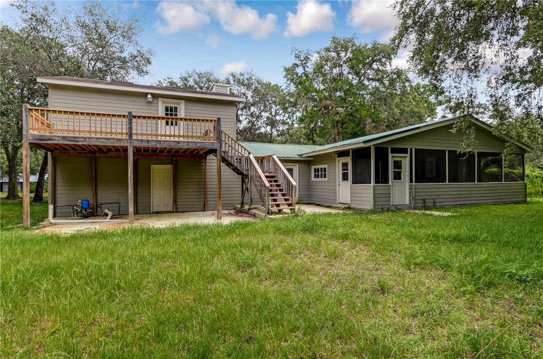 96231 Willyoung Road Yulee, FL 32097 - Photo 24 of 24 front view of a house with a yard