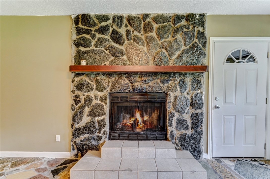 96231 Willyoung Road Yulee, FL 32097 - Photo 7 of 24 a living room with a fireplace