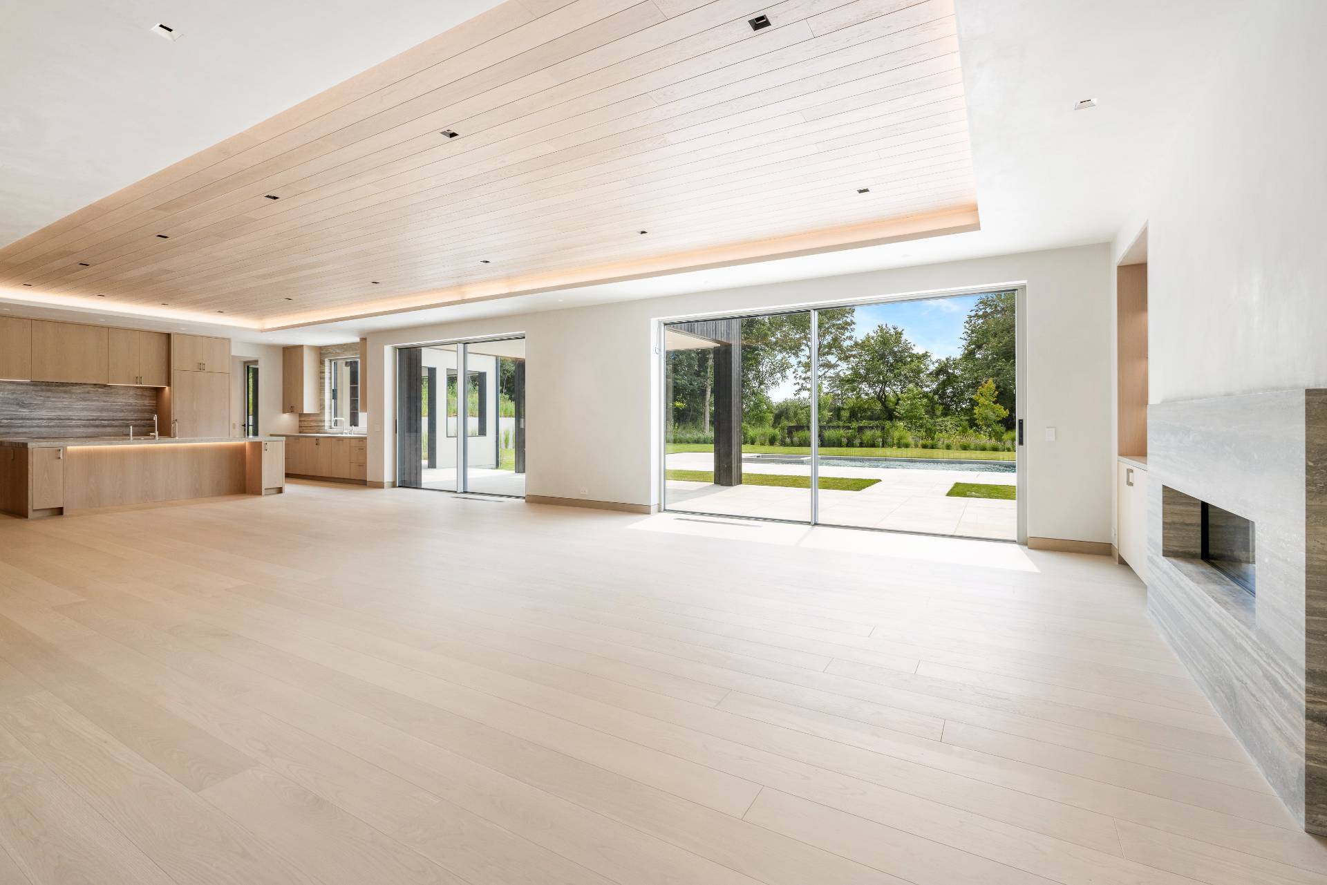 10 Mill Path Bridgehampton, NY 11963 - Photo 11 of 46 a view of an empty room with a fireplace and a window