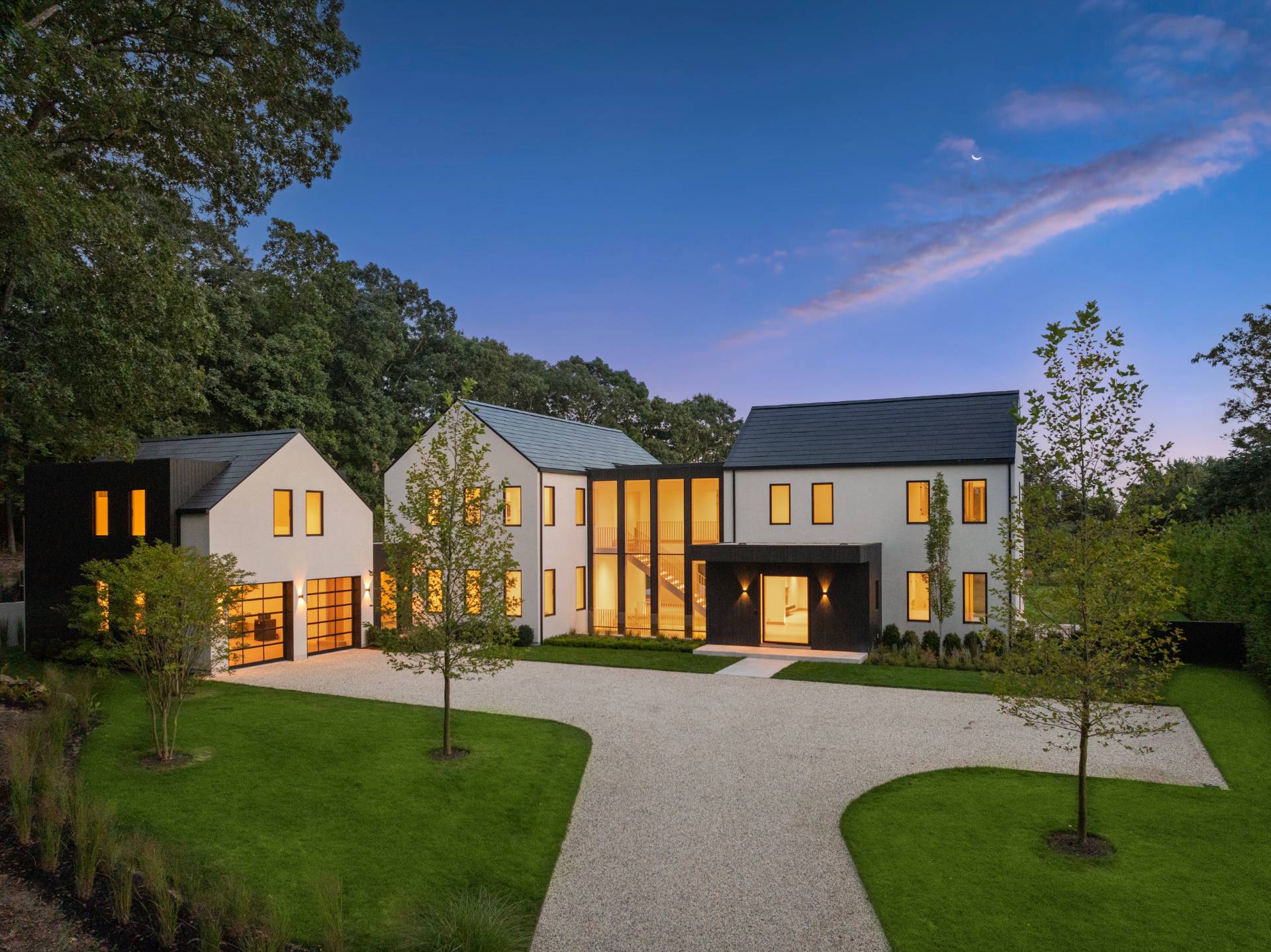 10 Mill Path Bridgehampton, NY 11963 - Photo 2 of 46 a front view of a house with a yard