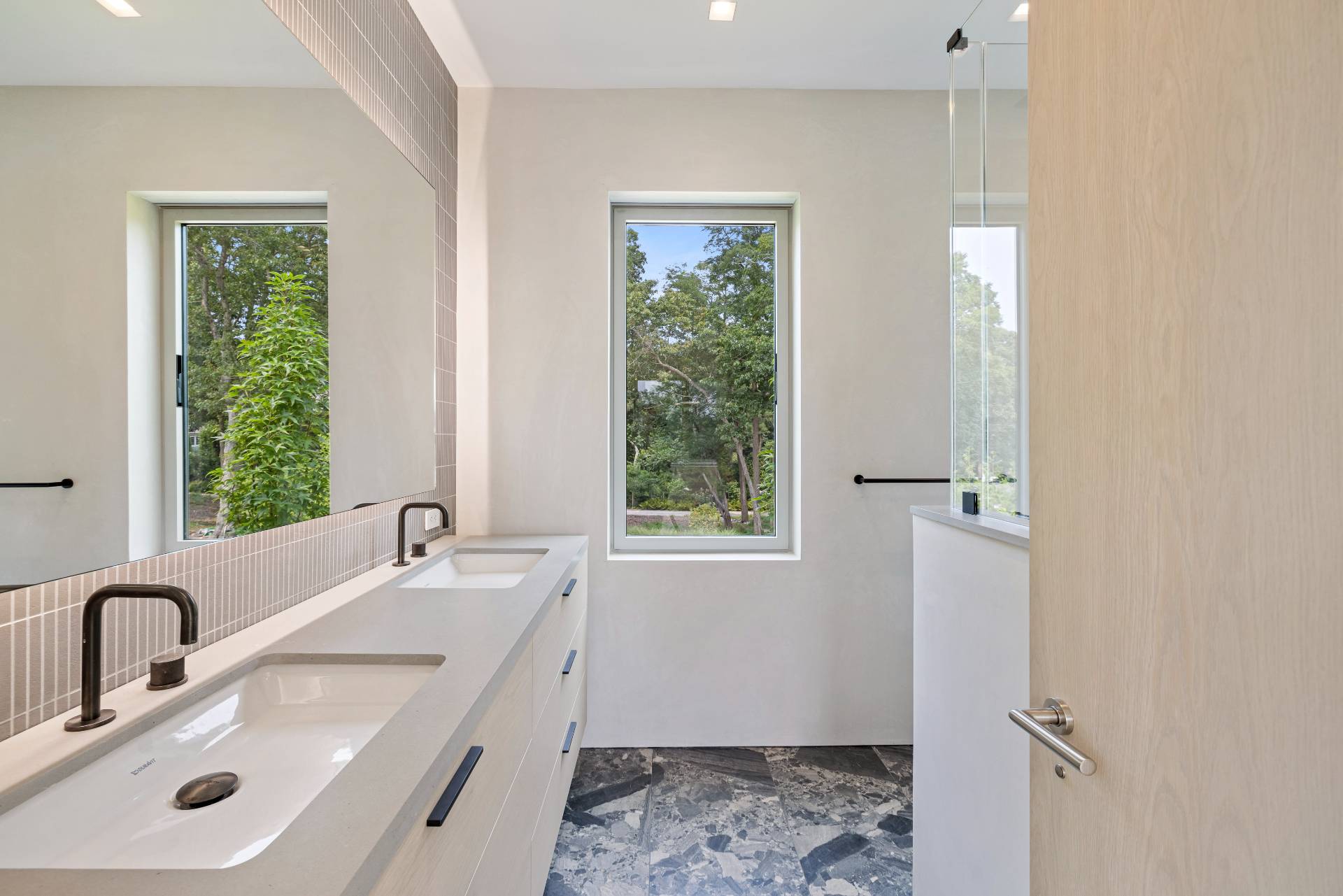 10 Mill Path Bridgehampton, NY 11963 - Photo 28 of 46 a bathroom with a sink and a bathtub