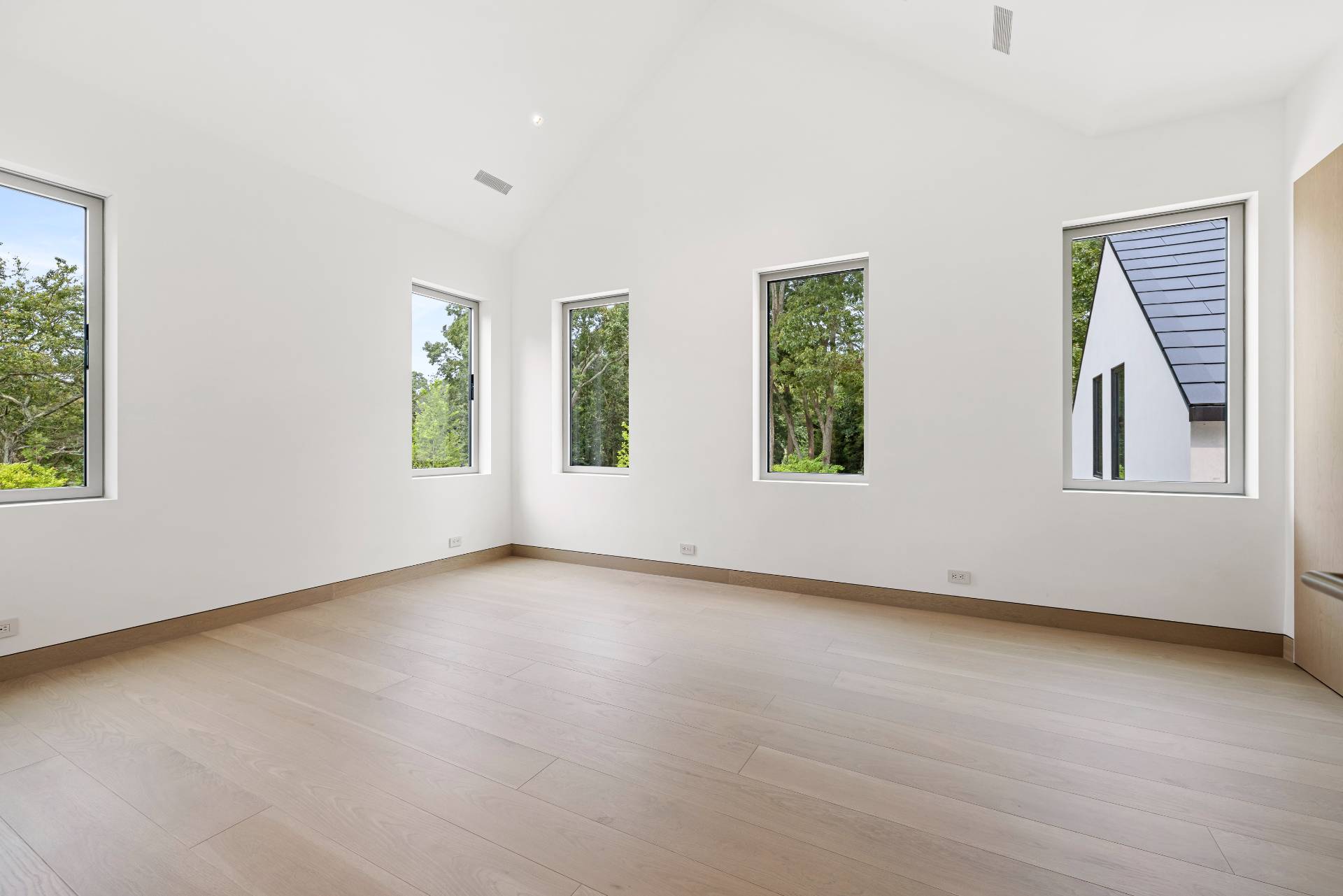 10 Mill Path Bridgehampton, NY 11963 - Photo 33 of 46 an empty room with windows