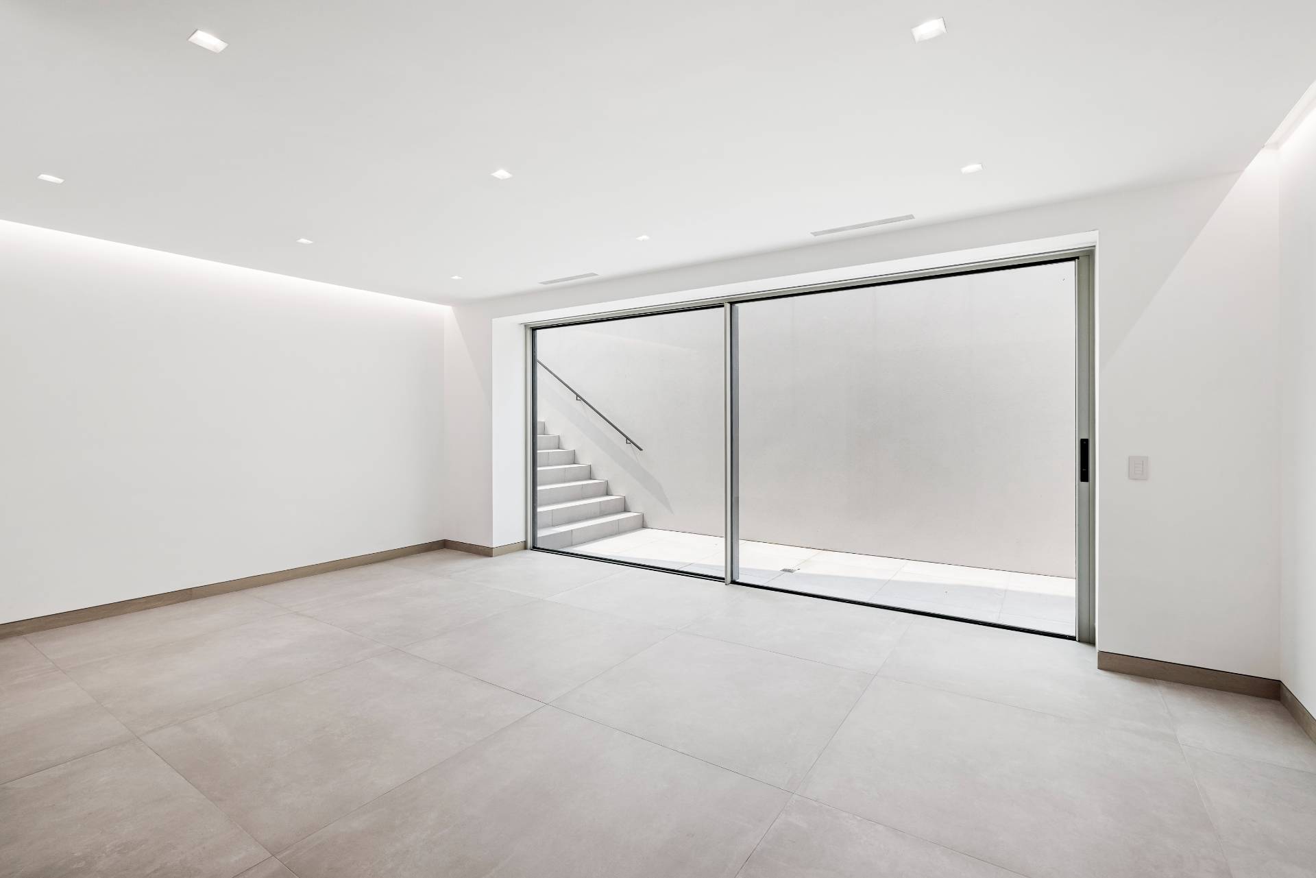 10 Mill Path Bridgehampton, NY 11963 - Photo 38 of 46 an empty room with fan