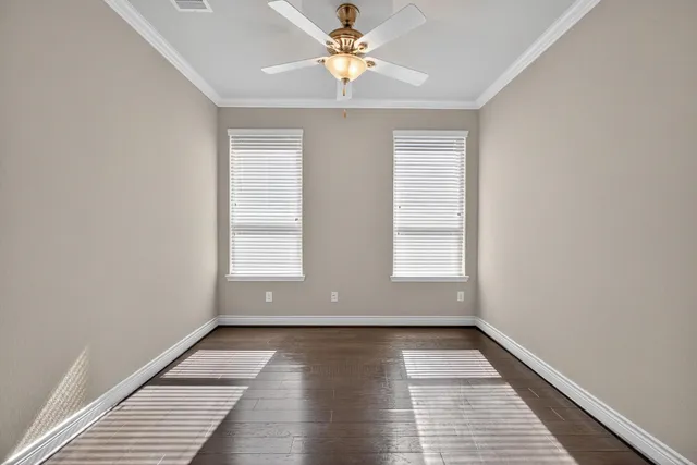 a view of room with window and hardwood floor