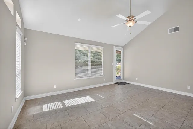 a kitchen with stainless steel appliances a refrigerator and a stove