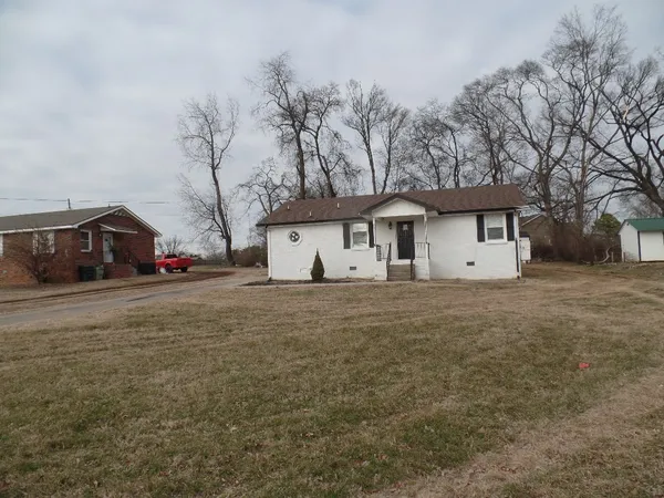 a house view with a garden space