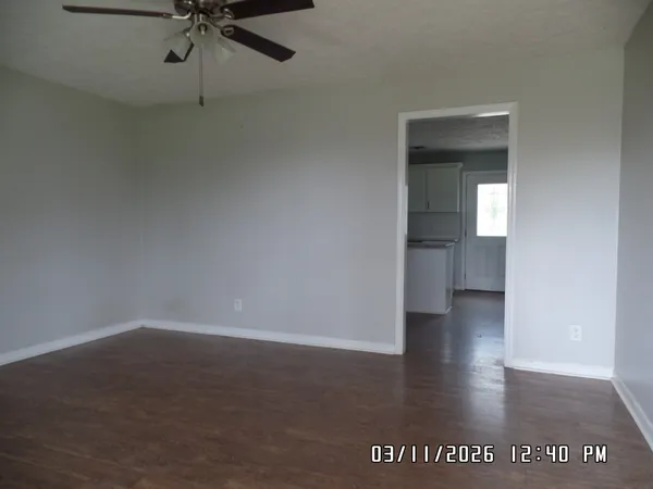 an empty room with a bathroom