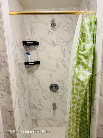 a kitchen with stainless steel appliances granite countertop a sink and a stove