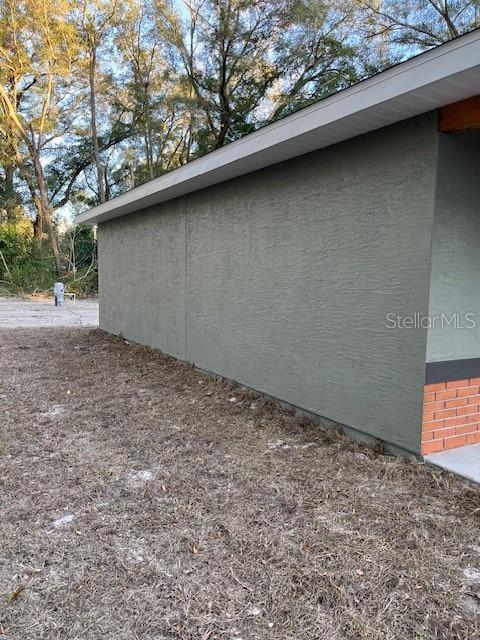 4366 Southeast 138th Street Summerfield, FL 34491 - Photo 19 of 23 a backyard of a house