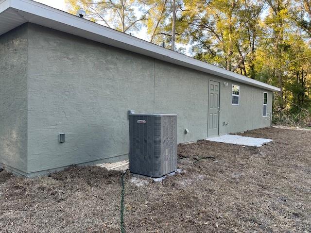 4366 Southeast 138th Street Summerfield, FL 34491 - Photo 21 of 23 a backyard of a house
